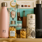 Luxury Birthday Celebration Gift Hamper UK edition, with shortbread, cashew nuts, insulated bottles, chocolate, and drink — beautifully presented in gold ribbon box by Gifts by Beulah Creations (UK).